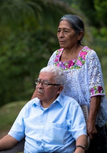 A man and woman standing next to each other.